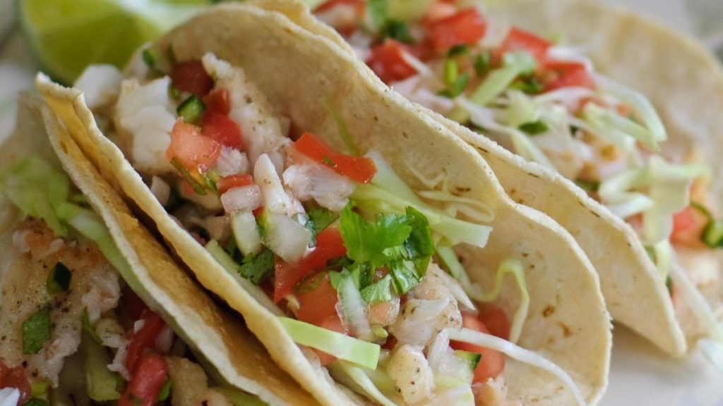 Fish tacos on dinner plate