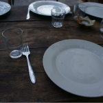 Empty dinner plate on wood table