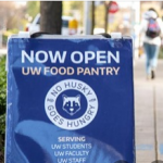 Sign saying Now Open UW Food Pantry