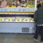 Photo of Washington resident shopping for food