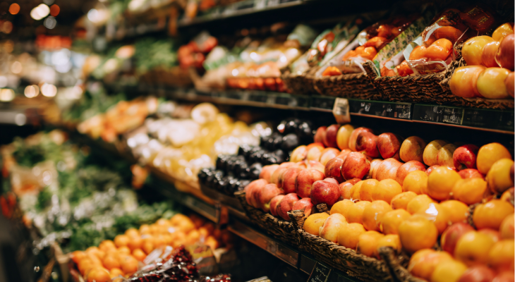Fruits and vegetables for sale at grocery store.